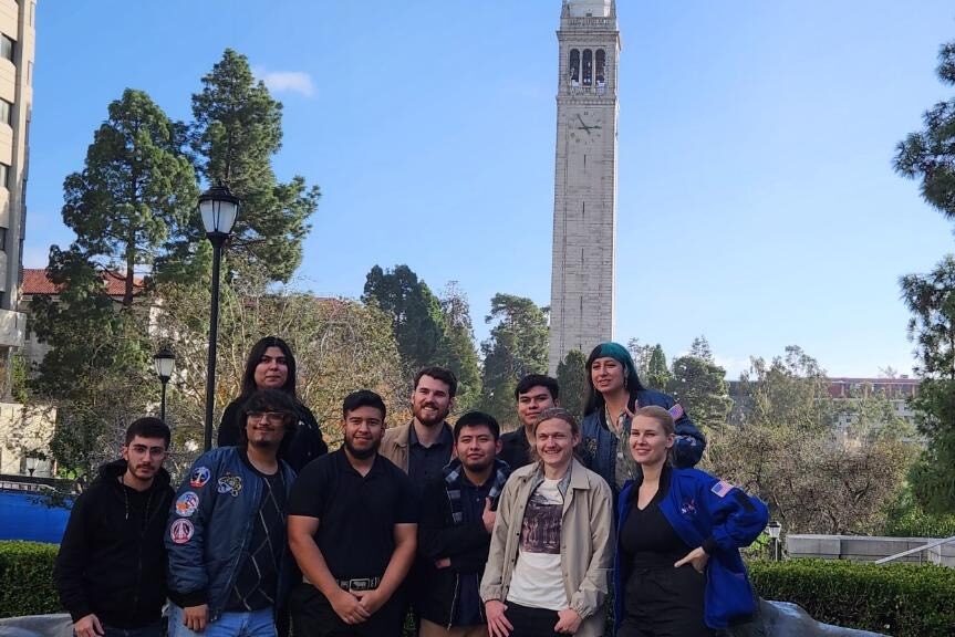 Group of students participating in NASA Community College Aerospace Scholars (NCAS) program pose for picture