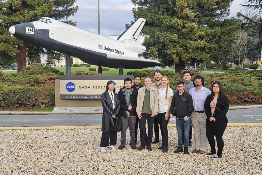 Group of students participating in NASA Community College Aerospace Scholars (NCAS) program pose for picture