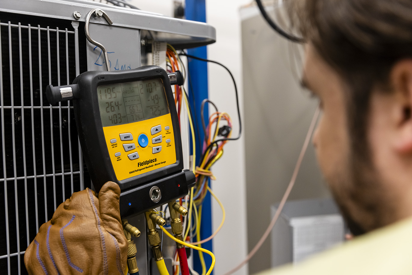 Detail image of a device used for maintenance and repairs of Heating, Ventilation, and Air Conditioning systems.