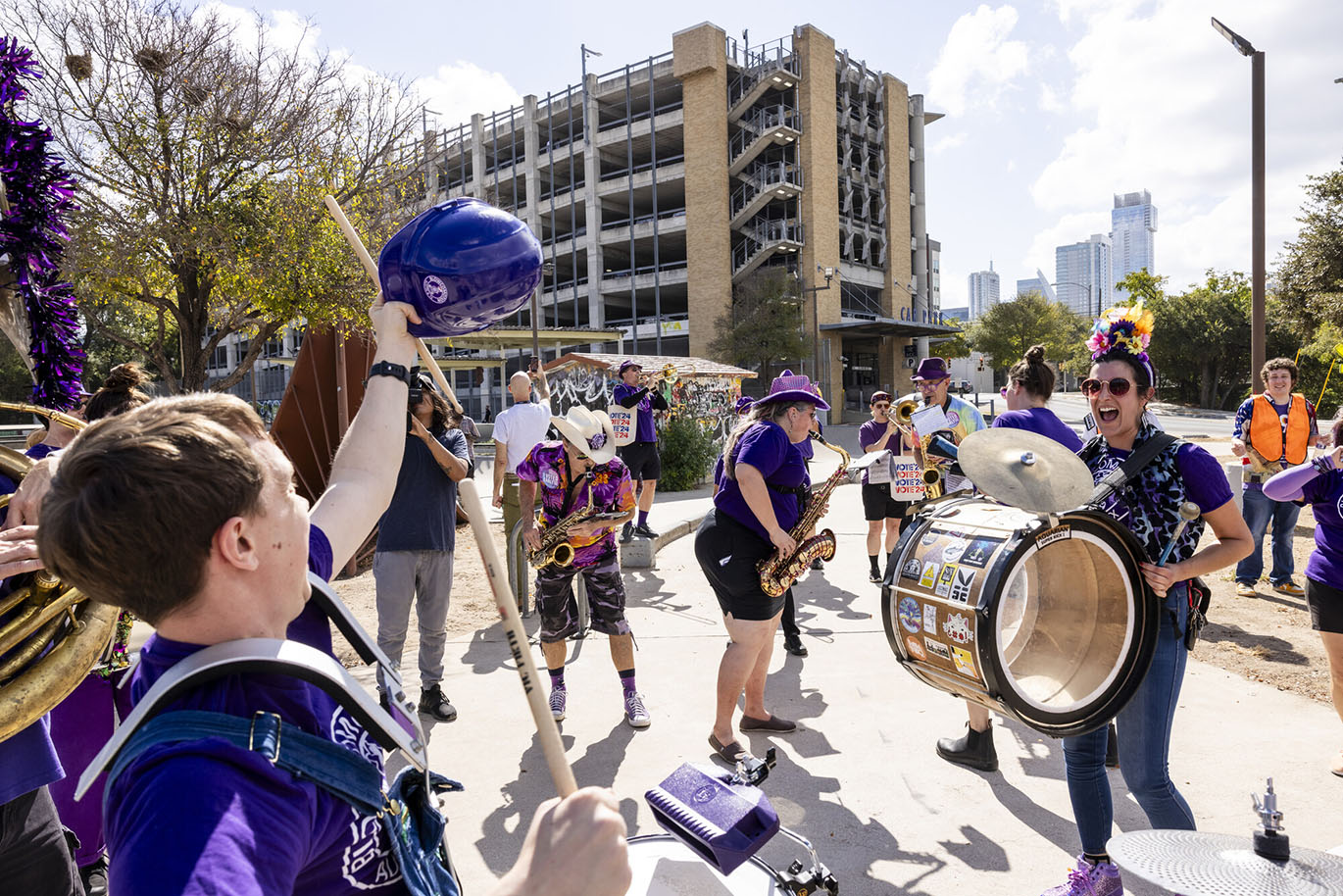 RGC Parade to the Polls A brass and percussion band performs outdoors during a parade to the polls event.