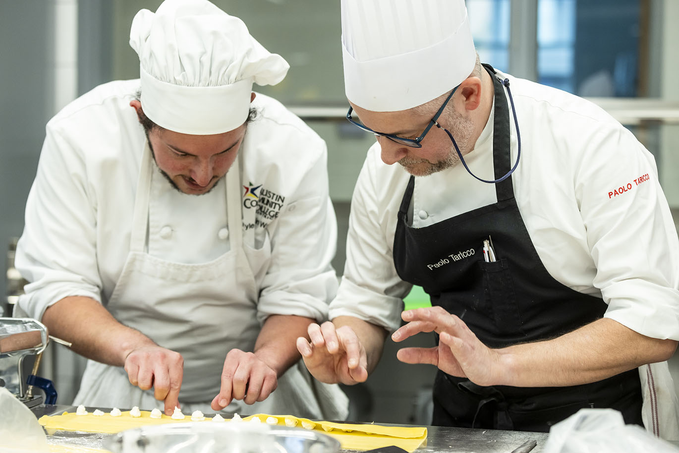 Culinary Arts - Chef Taricco Demo Italian Chef Paolo Taricco leads a hands-on pasta-making demonstration for Austin Community College Culinary Arts students, alumni, and industry partners on Wednesday, Jan. 28, 2025, in the Demonstration Kitchen at Highland Campus. Taricco, an instructor at Alba Accademia Alberghiera in Italy, is visiting as part of a partnership between the two programs, which includes a study abroad opportunity for ACC students in Italy.