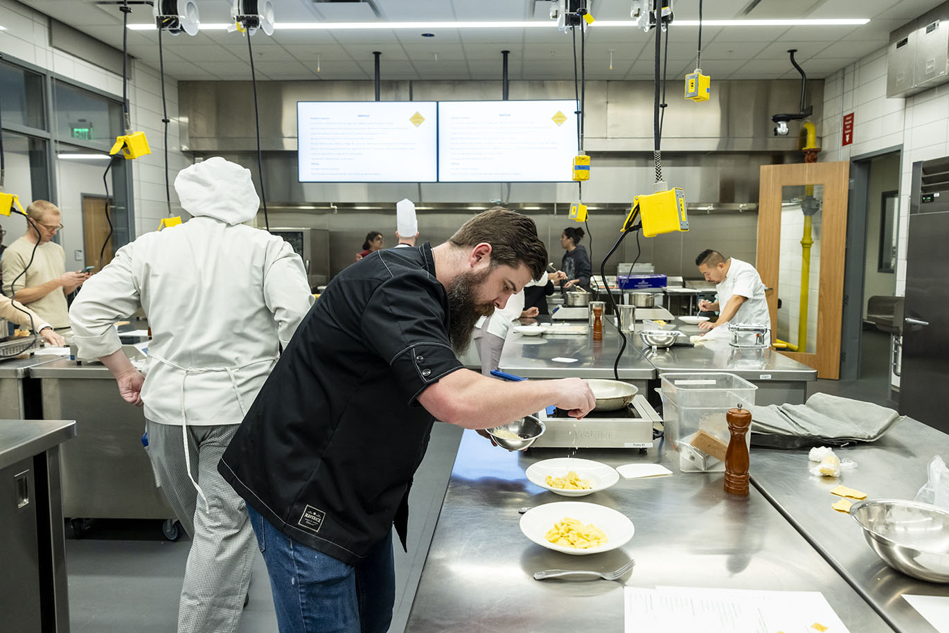 Culinary Arts - Chef Taricco Demo Italian Chef Paolo Taricco leads a hands-on pasta-making demonstration for Austin Community College Culinary Arts students, alumni, and industry partners on Wednesday, Jan. 28, 2025, in the Demonstration Kitchen at Highland Campus. Taricco, an instructor at Alba Accademia Alberghiera in Italy, is visiting as part of a partnership between the two programs, which includes a study abroad opportunity for ACC students in Italy.