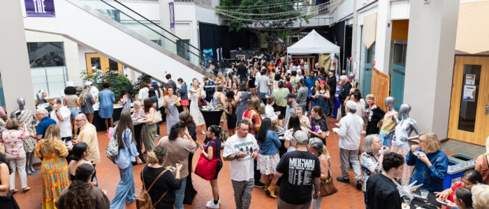 Guests mingle following the Visions Fashion Show