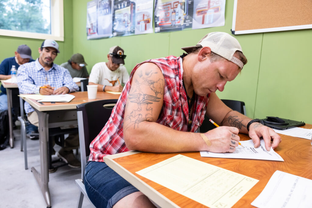 Members of the first cohort of HVAC trainees with The Other Ones Foundation (TOOF) photographed during class on Friday, July 25, 2025, at the TOOF training center in Austin, Texas. The foundation’s Vocational Training Program - developed in partnership with Austin Community College District, Workforce Solutions Capital Area, and philanthropist John Paul DeJoria - provides hands-on training and pathways to employment for individuals exiting homelessness.