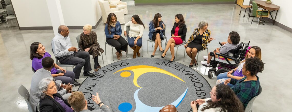 ACC Truth Racial Healing and Transformation (TRHT) leadership, staff and stakeholders participate in a photo shoot on Monday, November 17, 2021, at the Highland Campus.